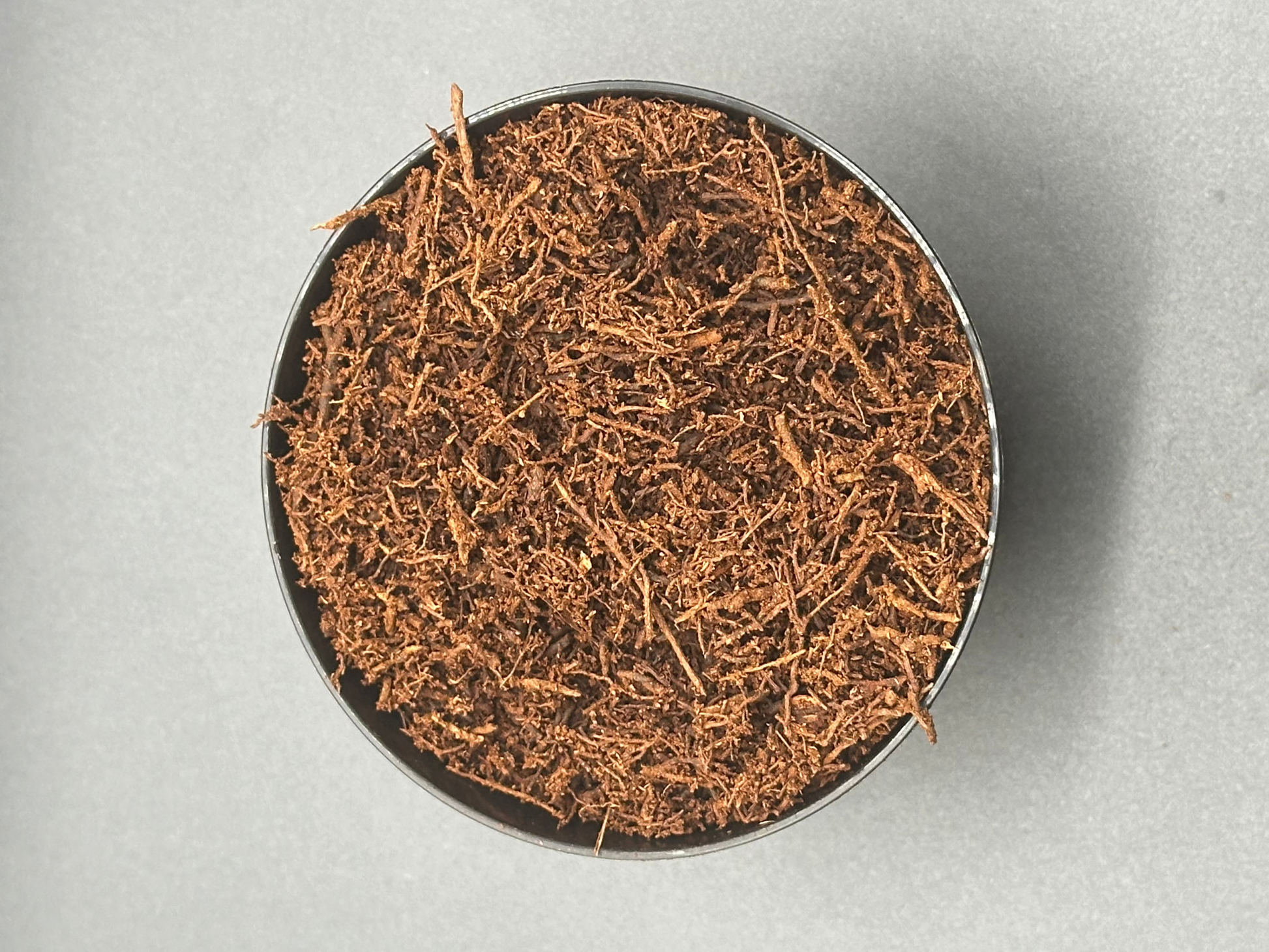Premium New Zealand Tree Fern Fiber in a bowl, ideal for anthurium and aroids, showcasing brown shavings that highlight its natural texture.
