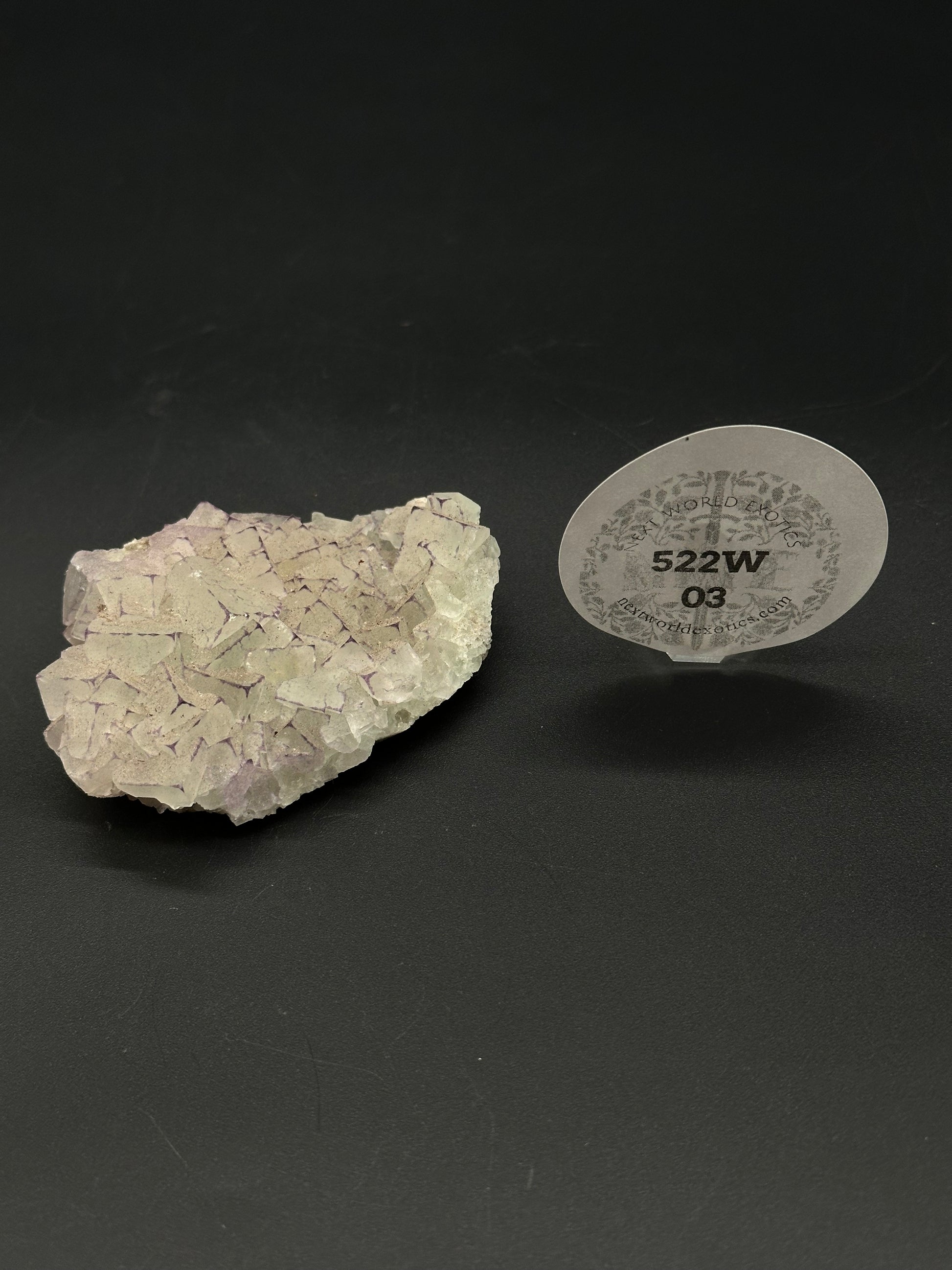 QR Code Fluorite (522W03), a natural mineral, 2.7 inches long, UV reactive, showcasing intricate patterns and textures. Ideal for collectors and enthusiasts.