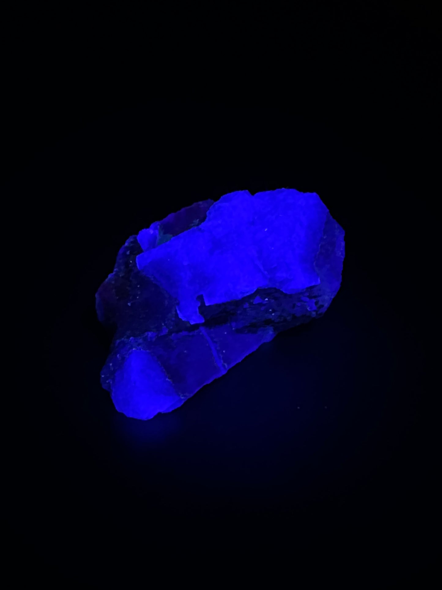 Raw Fluorite (522W02) crystal, showcasing its natural, unpolished form with distinctive geometric patterns, ideal for collectors or mineral enthusiasts seeking unique specimens.