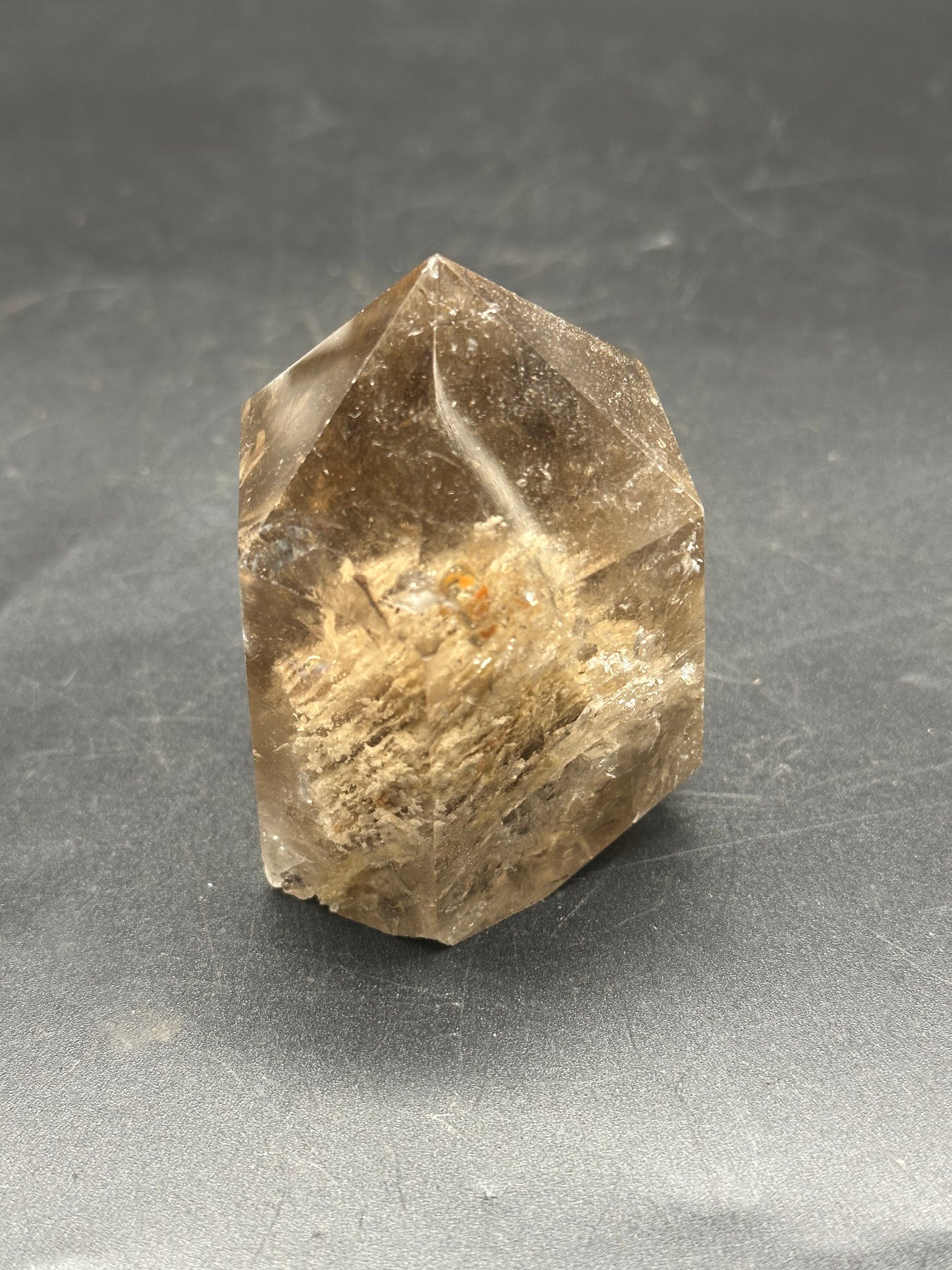 Smokey Garden Quartz (1212W22) crystal, featuring a clear, textured surface on a flat base, showcasing its natural mineral formation.