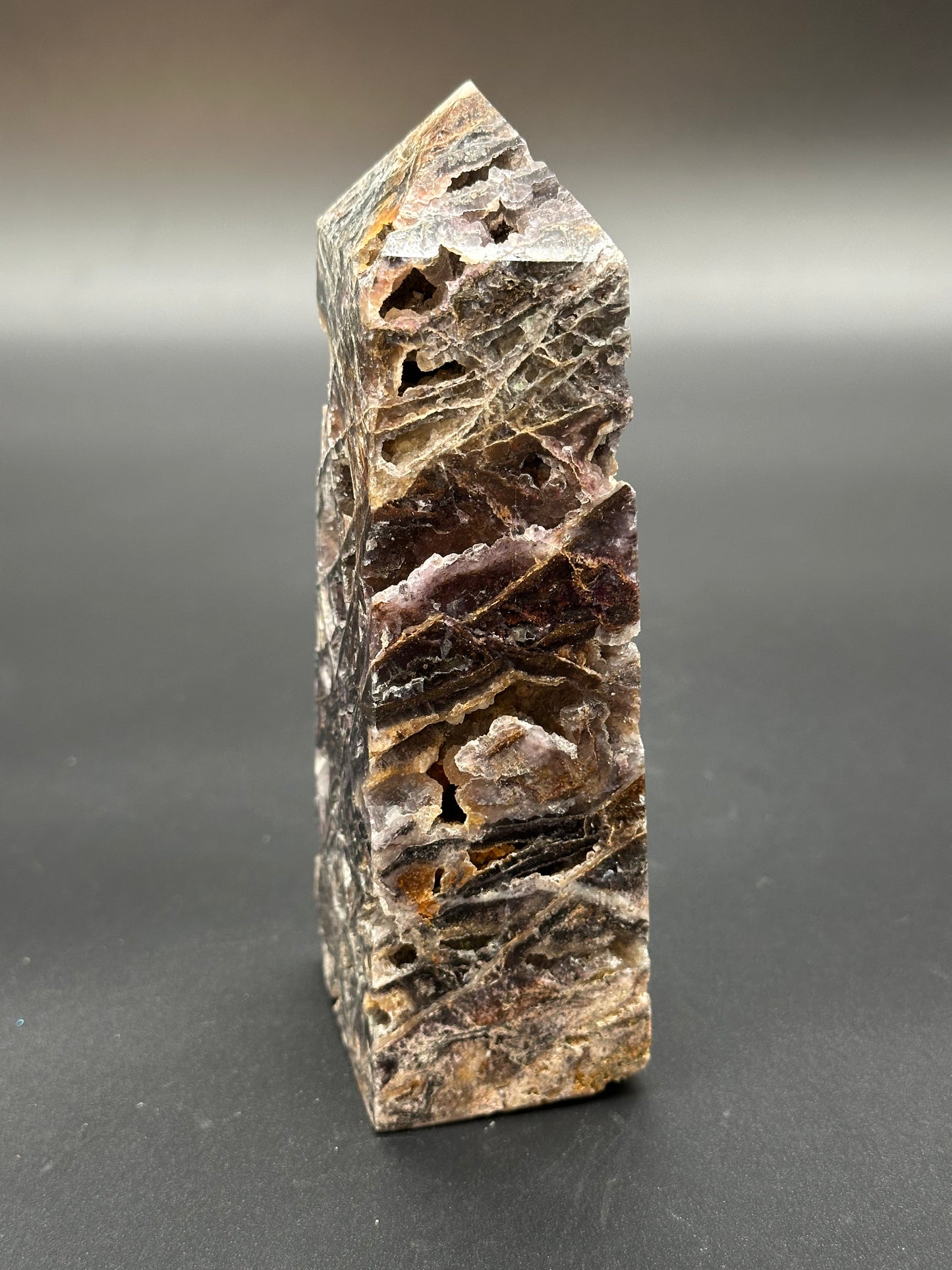 Sphalerite Tower (36W18) close-up, showcasing a detailed view of its mineral texture and intricate surface, highlighting its natural rock formation.