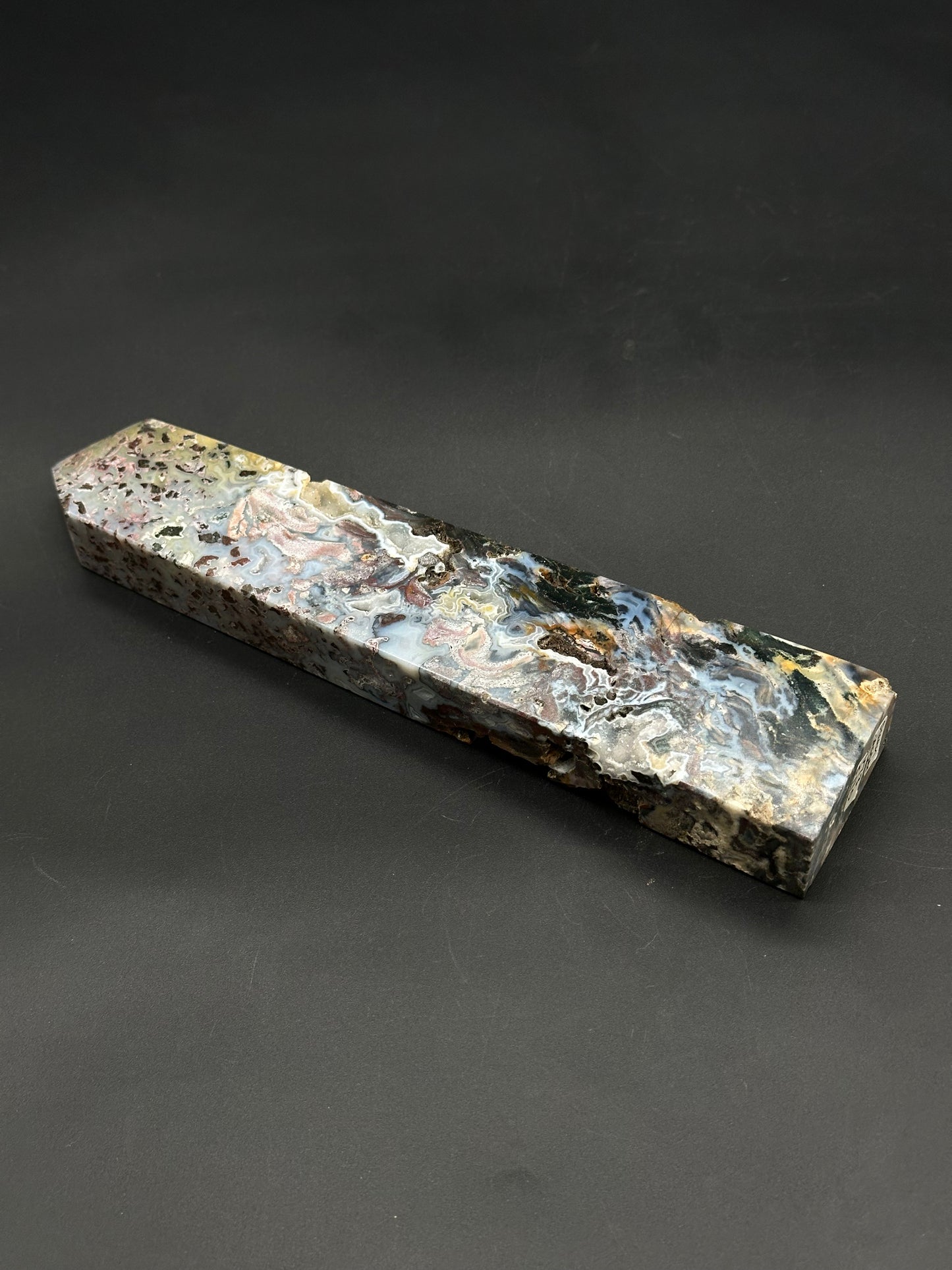 Ocean Jasper Tower (812W08) features a marbled, resin-stabilized wood block ideal for crafting knife handles or pen bodies, showcasing fluid swirls and occasional voids.