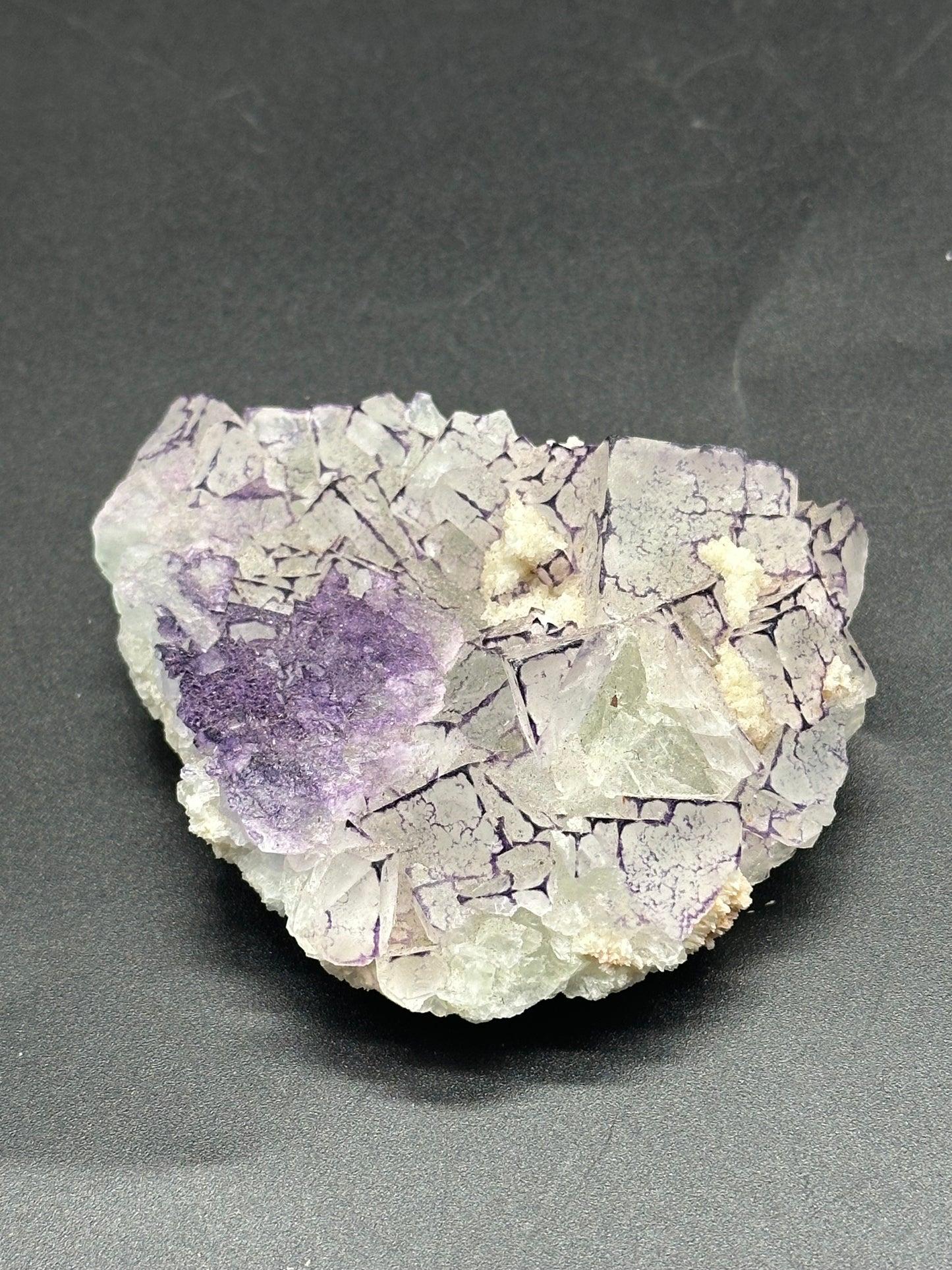 Close-up of QR Code Fluorite (1024W51), showcasing its detailed mineral texture and structure, highlighting its use as a collectible crystal.