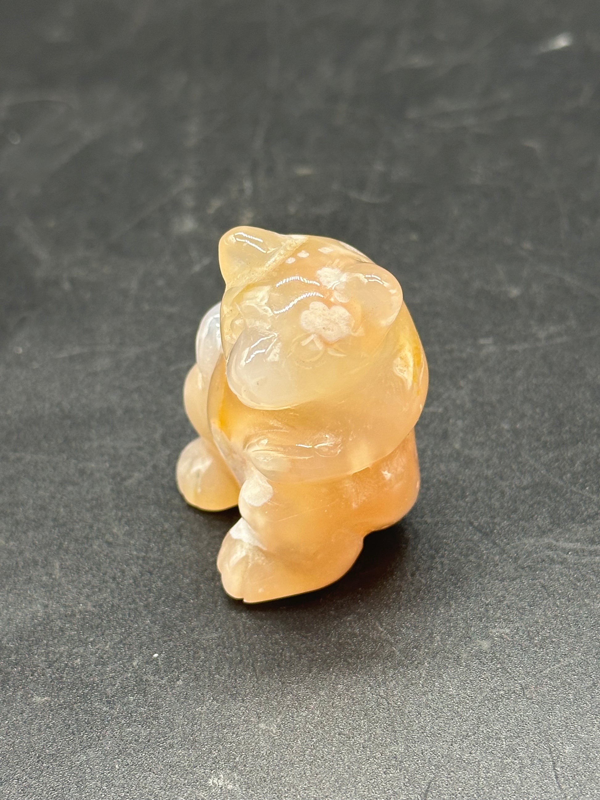 Agate Bear Carving (103W44) sculpture featuring a detailed, small bear figure with a smooth finish, highlighting its intricate craftsmanship.