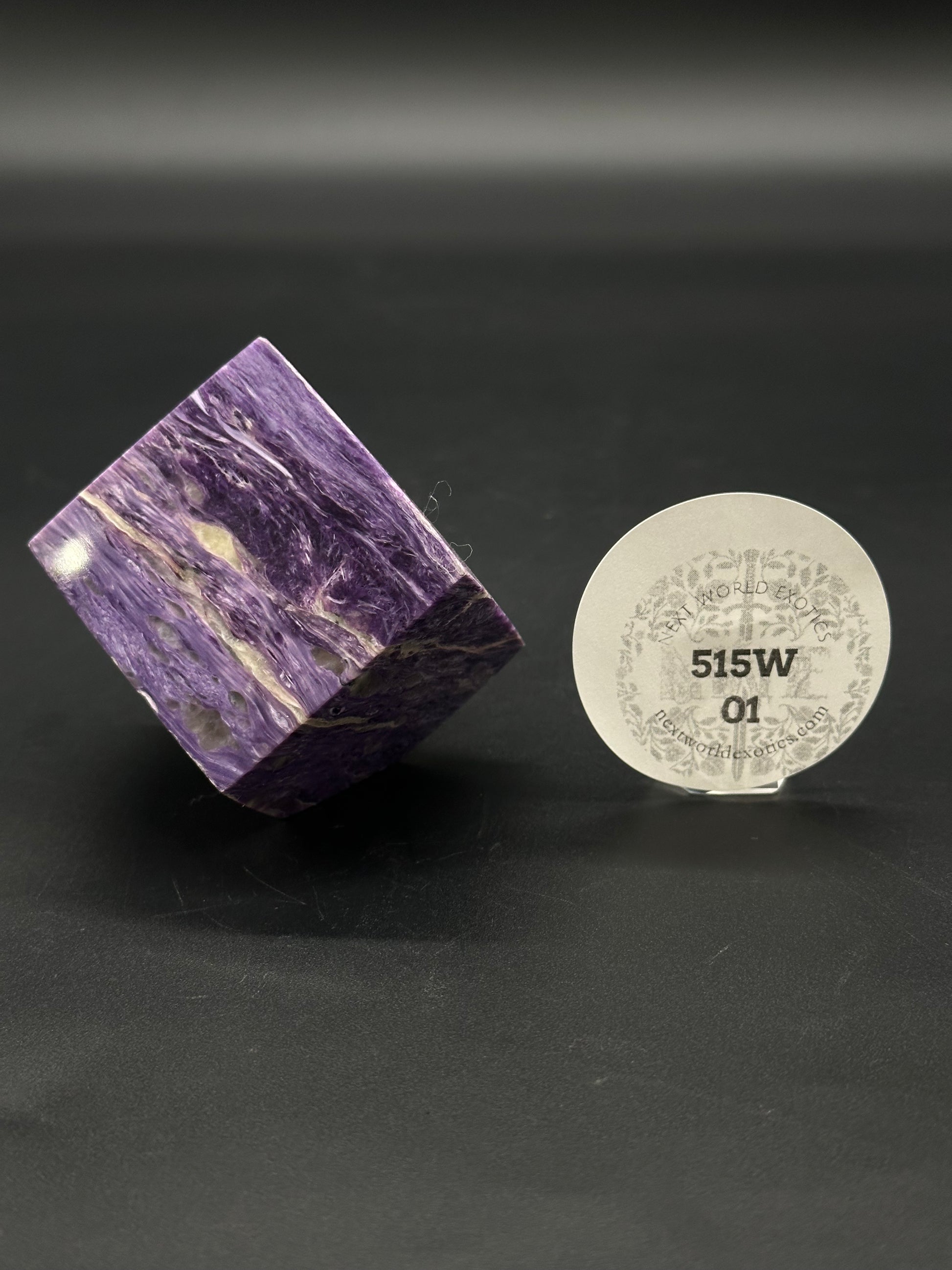 Charoite Cube (515W01) showcasing its distinctive mineral structure and polished surface, ideal for crystal enthusiasts and collectors seeking unique geological specimens.