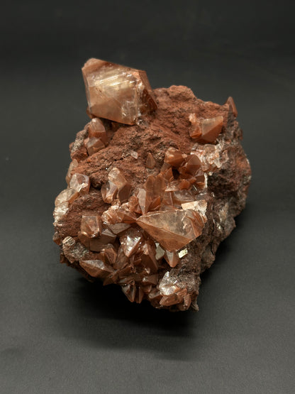 Diamond Calcite (508W26) features a faceted surface, showcasing its distinct crystal structure and natural luster, ideal for collectors or mineral enthusiasts.