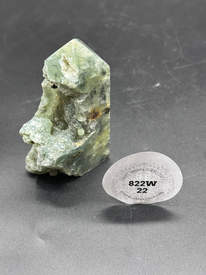 Prenite and Epidote Tower with Raw Edge, showcasing a detailed close-up of the stone's intricate mineral formations and natural textures.