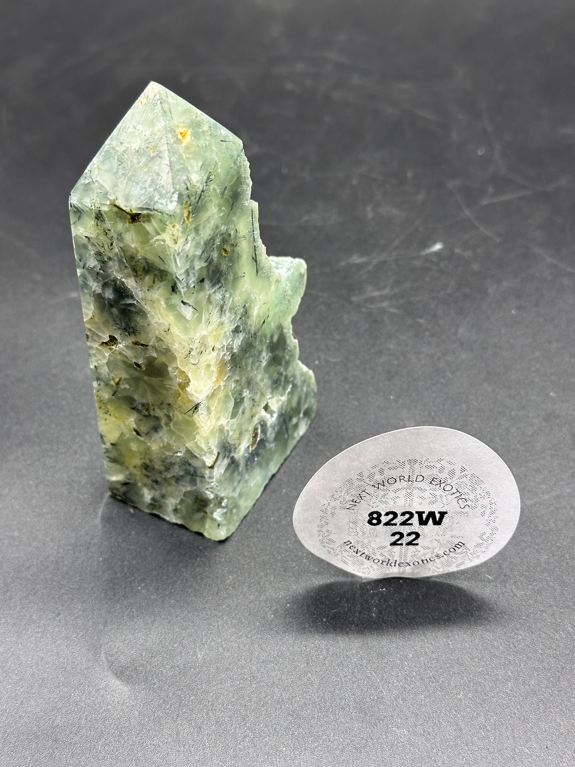 Prenite and Epidote Tower with Raw Edge showcasing a detailed close-up of the green and white crystal formation.