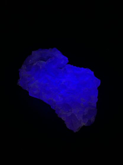 Raw Fluorite (515W02) crystal, showcasing natural geometric formations and smooth surfaces, ideal for mineral collectors or decor enthusiasts.