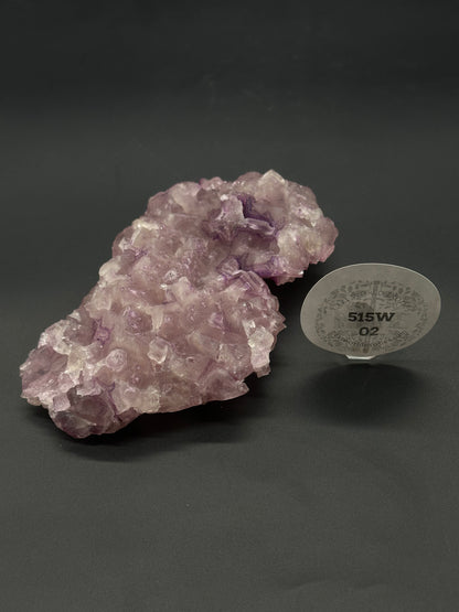 Raw Fluorite (515W02) crystal, showcasing its natural facets and textures, ideal for collectors or as a decorative mineral piece.