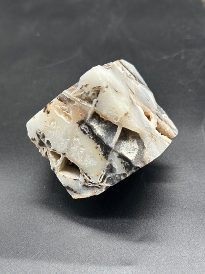 Close-up of a Sphalerite Cube (1024W46), highlighting its intricate mineral structure, showcasing a detailed surface typical of a rock or mineral sample.