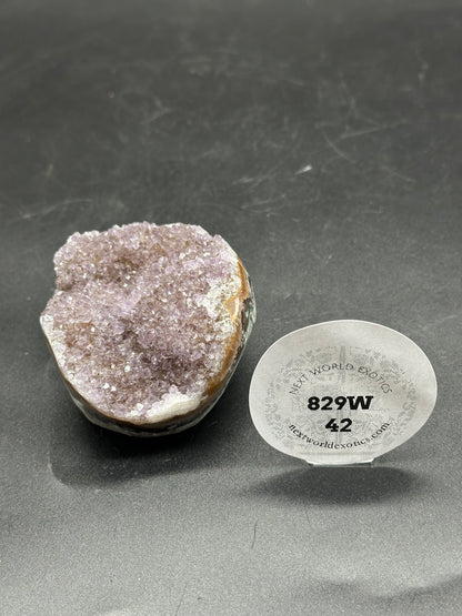 Sugar Fluorite Bowl (829W42) featuring a round white sticker with a close-up of a purple rock.