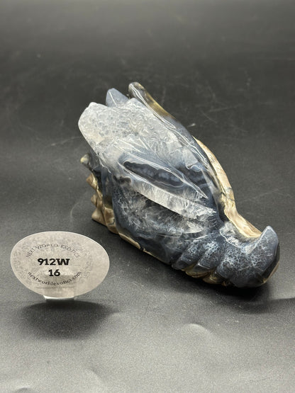 Volcanic Agate Dragon Carving, a detailed stone sculpture of a dragon's foot, showcasing intricate craftsmanship and natural beauty. Perfect for collectors and decor enthusiasts.